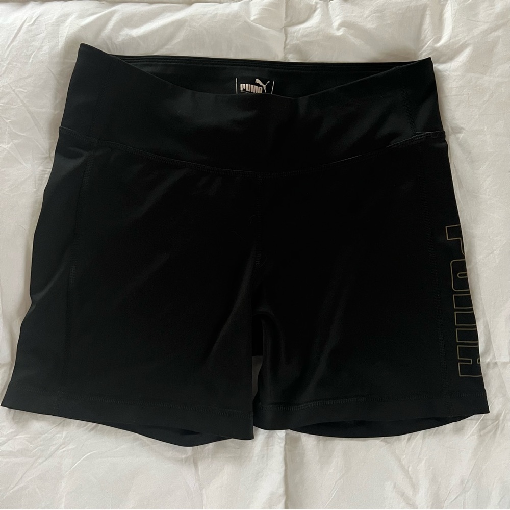 Item Details: Puma black and gold yoga shorts
Brand: Puma
Size: L
Fabric: N/A